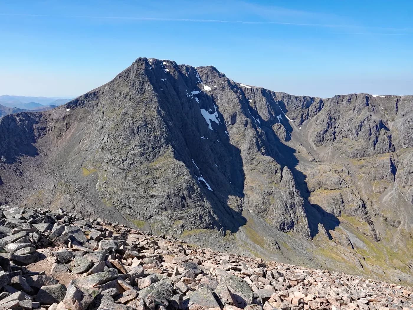 The steep cliffs of Ben Nevis's north face seen from Carn Mor Dearg