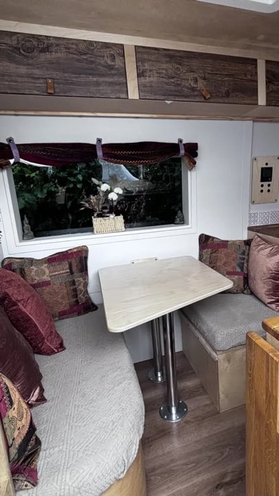 A campervan interior dinette and fittings