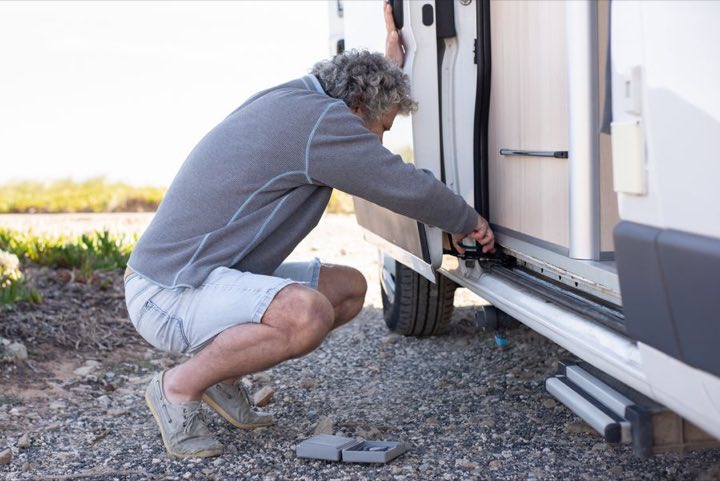 Checking a campervan's door mechanism before a trip
